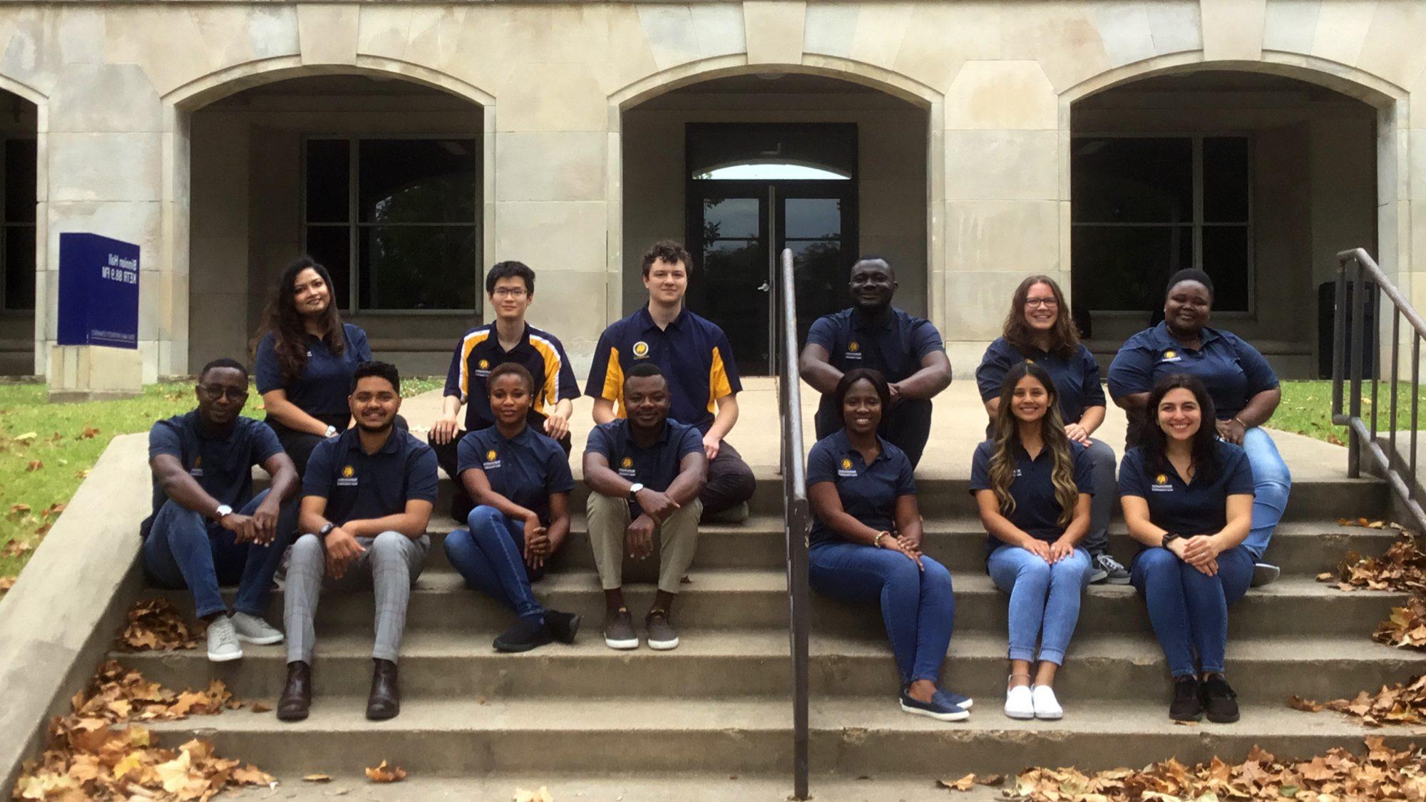 A group of students in front of the binnon building.